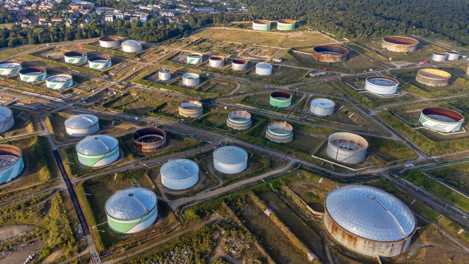 Aerial view of a modern energy facility at dusk